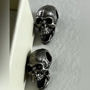 2 Silver Colored Skeleton Head Charms